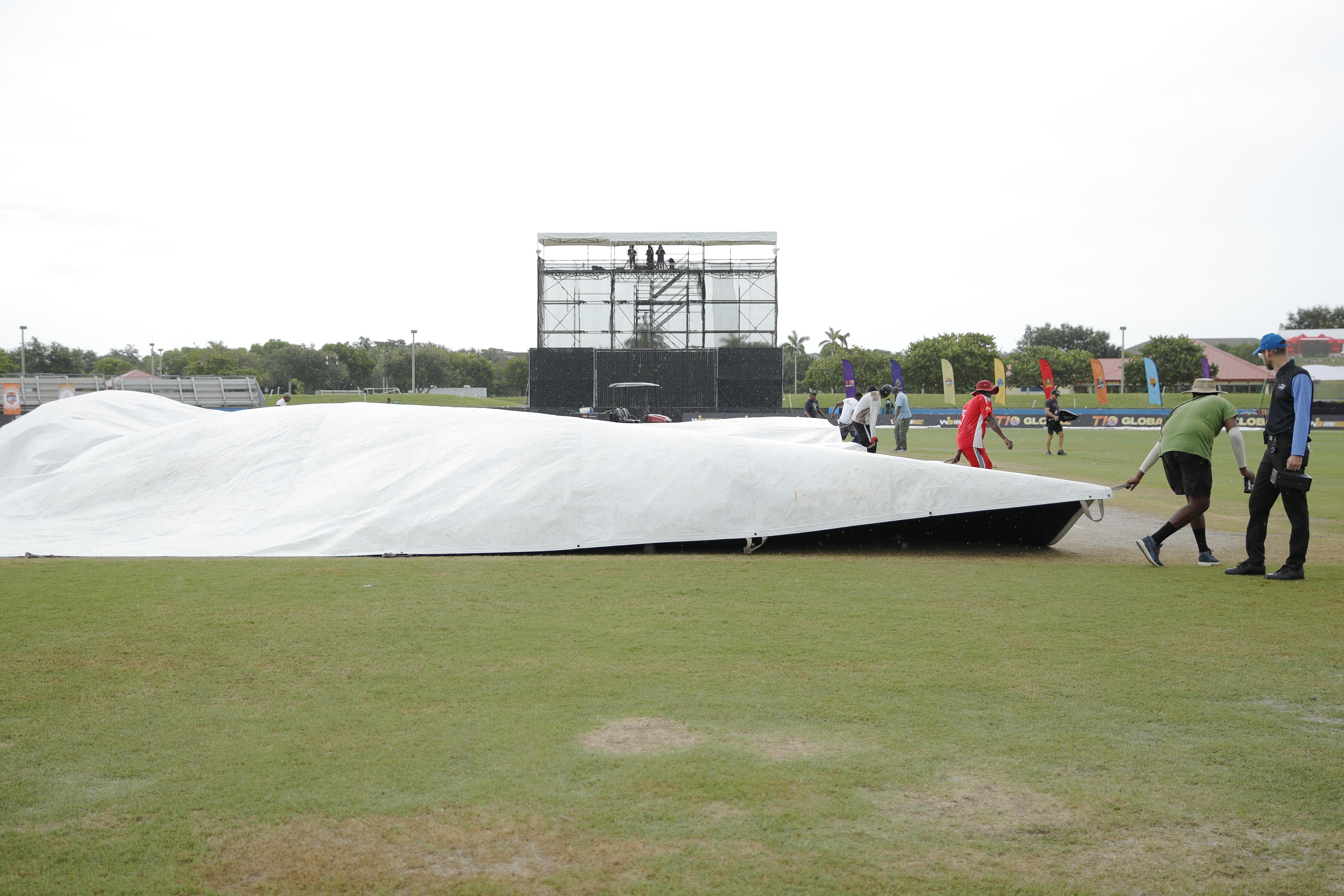Pitch covers coming up to protect playing pitch from rain during match 1 of the US Masters T10 League between the Atlanta Riders and the Texas Chargers at the Central Broward Park in Lauderhill, Florida on the 18 August 2023Photo by Saikat Das / ACEIMAGES for US Masters T10