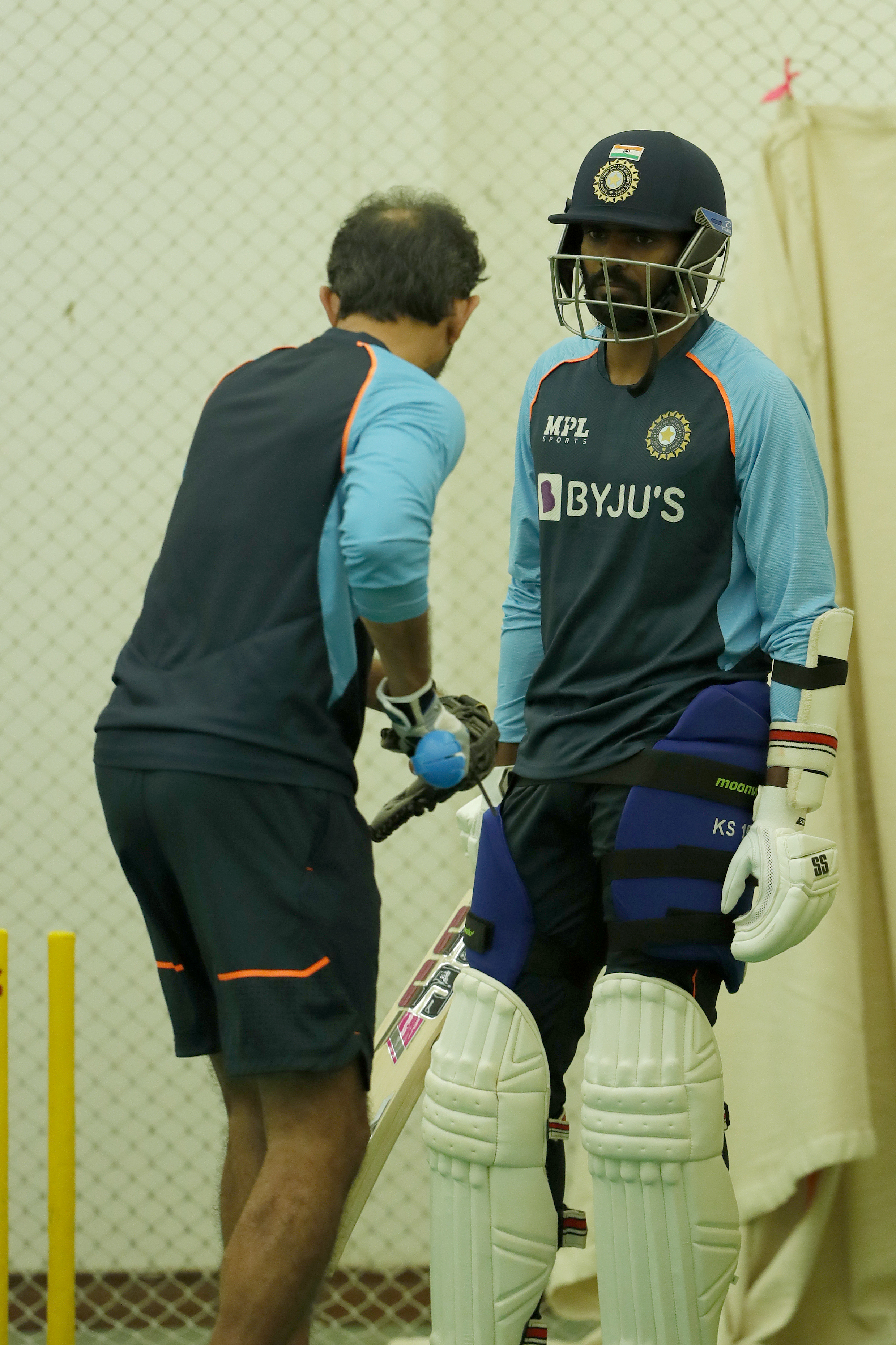 K.S.Bharat wicket-keeper) of India with Vikram Rathour of India  during the India team practice session held at the Bandra Kurla Complex Ground in Mumbai on the 2nd December 2021Photo by Saikat Das / Sportzpics for BCCI