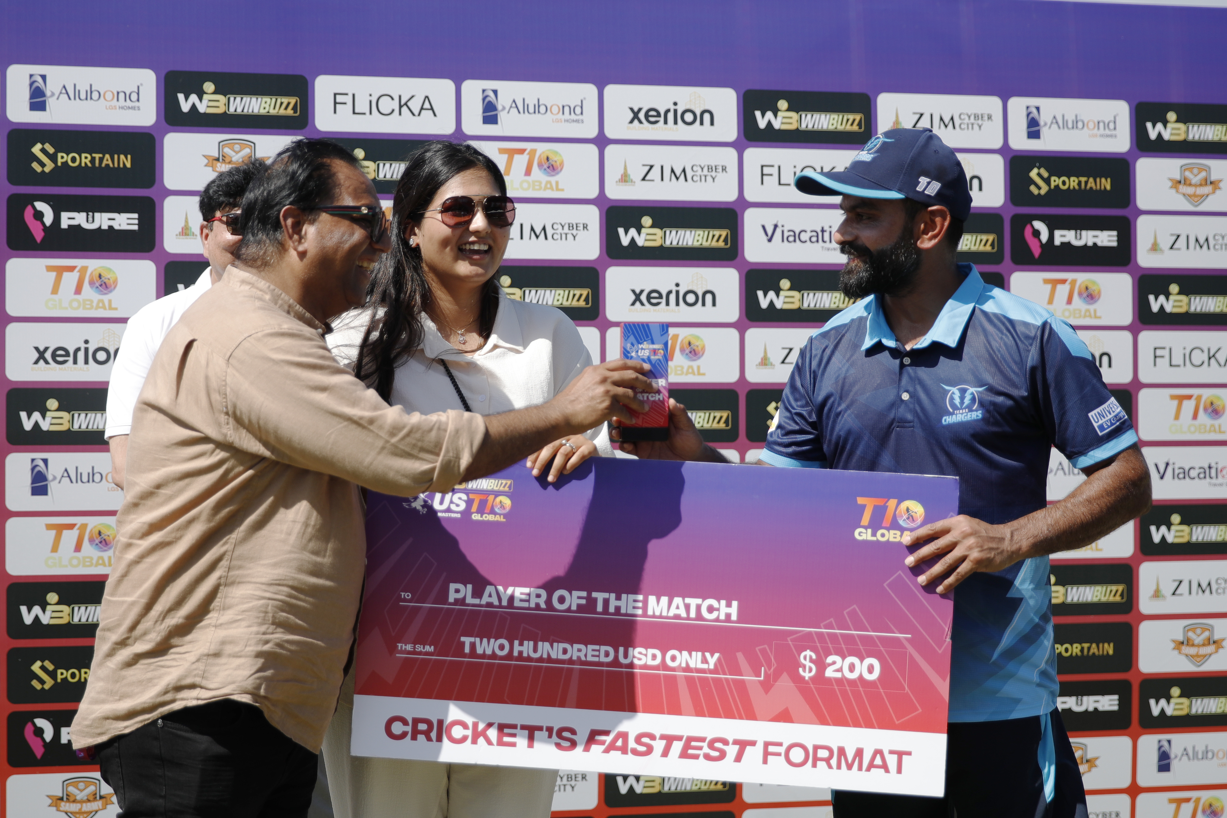 Mohammad Hafeez of Texas Chargers with Player of the Match award along with Nawab Shaji Ul Mulk The Founder & Chairman of T Ten Sports Management & T Ten Global Sports and his family during match 24, Qualifier 2 of the US Masters T10 League between the Texas Chargers and the California Knights at the Central Broward Park in Lauderhill, Florida on the 26th August 2023 Photo by Saikat Das / ACEIMAGES for US Masters T10