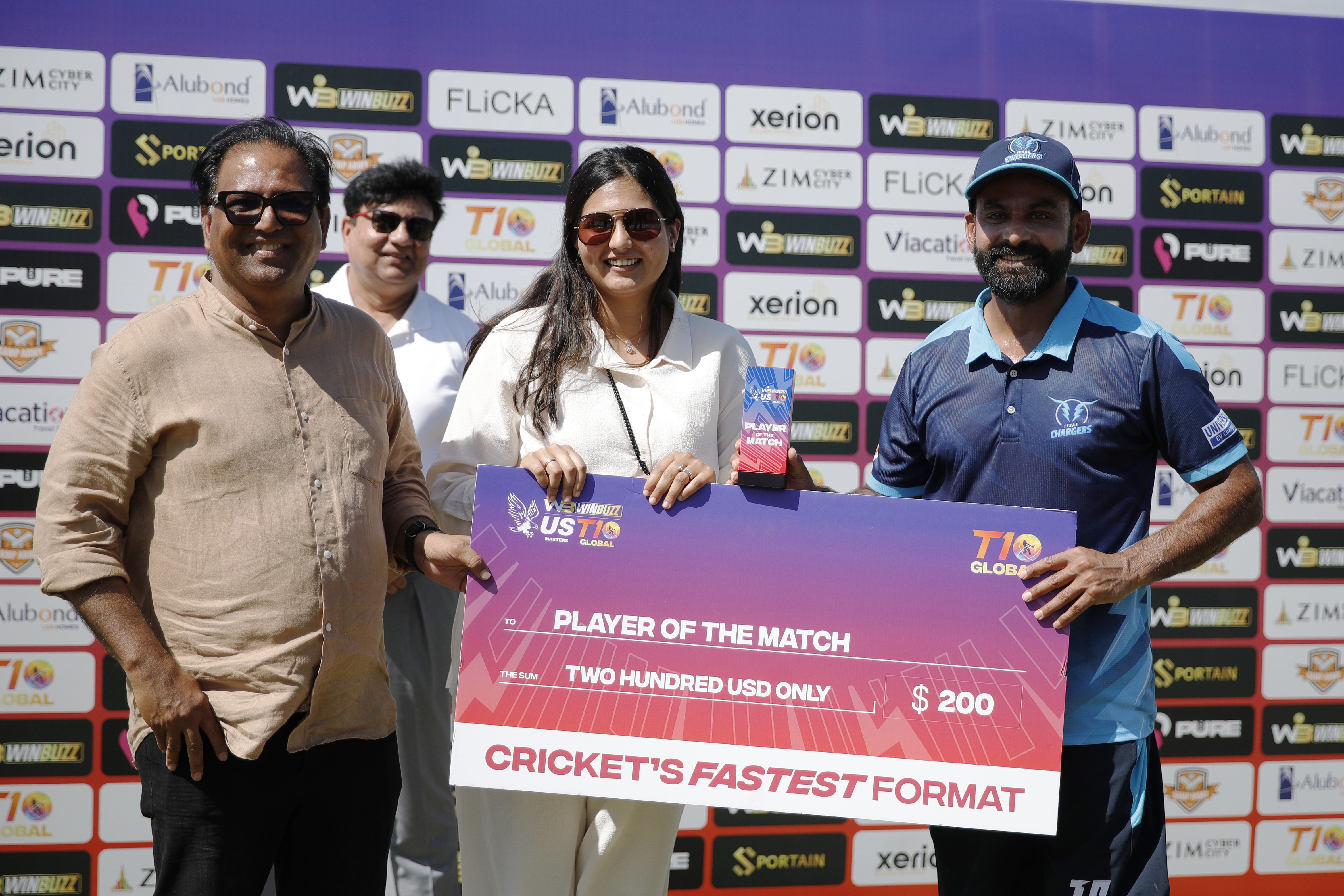 Mohammad Hafeez of Texas Chargers with Player of the Match award along with Nawab Shaji Ul Mulk The Founder & Chairman of T Ten Sports Management & T Ten Global Sports and his family during match 24, Qualifier 2 of the US Masters T10 League between the Texas Chargers and the California Knights at the Central Broward Park in Lauderhill, Florida on the 26th August 2023 Photo by Saikat Das / ACEIMAGES for US Masters T10