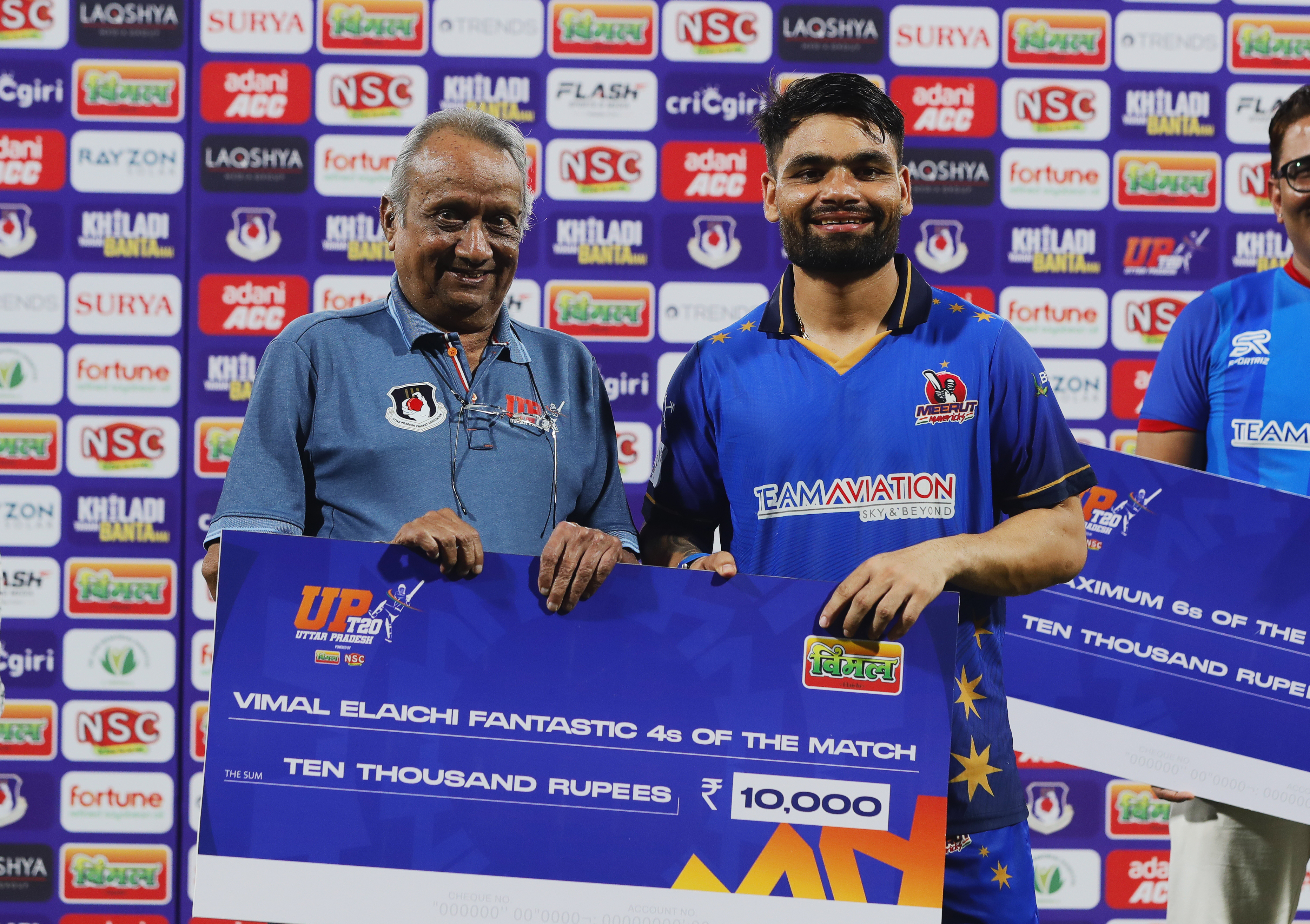 Rinku Singh of Meerut Mavericks receiving Vimal Elaichi Fantastic 4s of the Match award during the UPT20 League 2026 Season 4 opening clash between Kashi Rudras and defending champions Meerut Mavericks at Bharat Ratna Shri Atal Bihari Vajpayee Ekana Cricket Stadium, Lucknow, Uttar Pradesh, India, intense evening T20 action lights up Match 1 of the tournament.Photos by: s Saikat Das / aceimages.in for UPT20