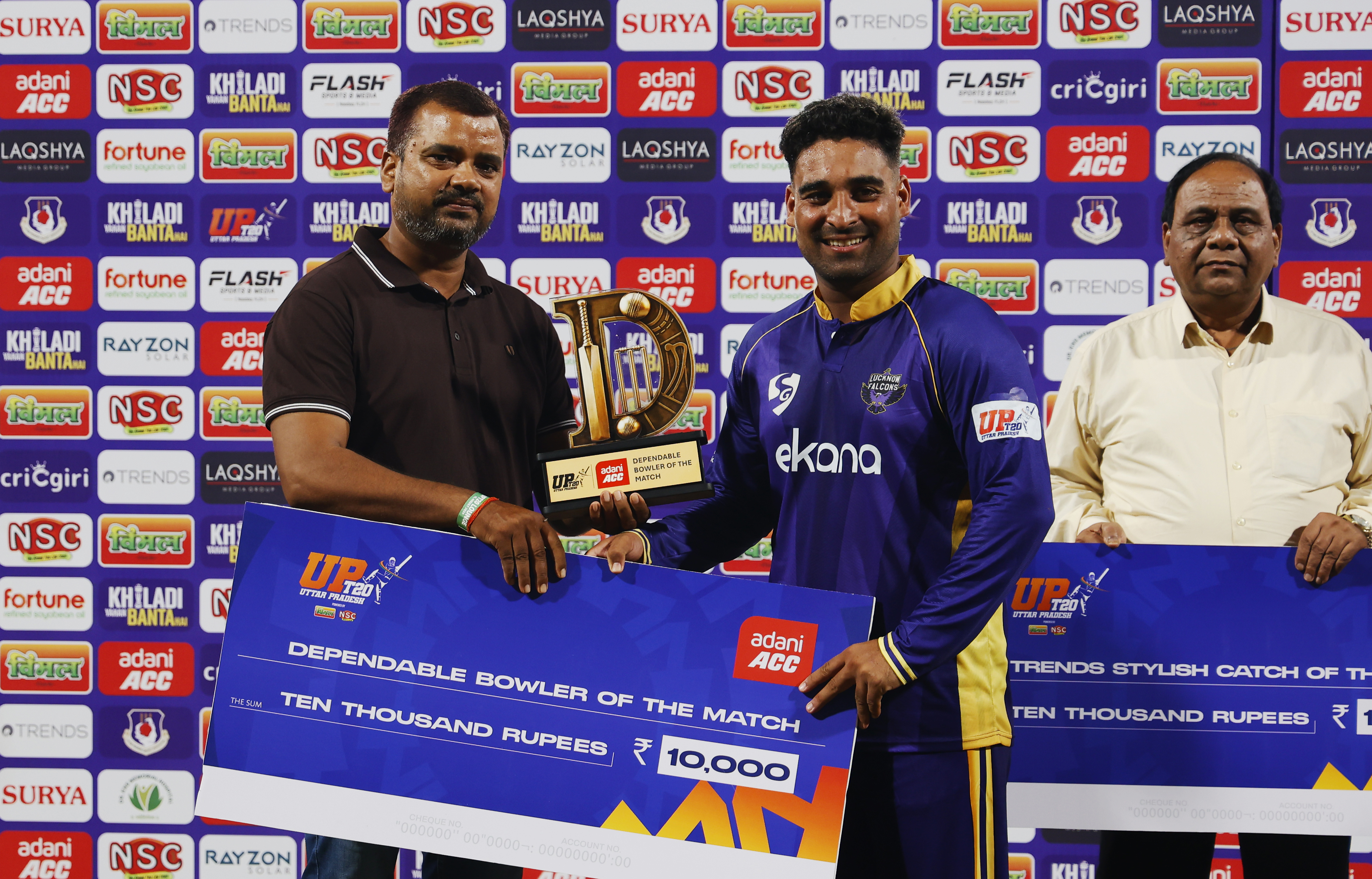 Vipraj Nigam of Lucknow Falcons receiving Dependable Bowler of the Match award during the UPT20 League Season 4 evening clash on 15 August 2026 at Bharat Ratna Shri Atal Bihari Vajpayee Ekana Cricket Stadium, Lucknow, Uttar Pradesh, India, Lucknow Falcons face Gaur Gorakhpur Lions in Match 3 under lights as the league’s double‑header day closes with high‑tempo T20 cricket.Photos by: s Saikat Das / aceimages.in for UPT20
