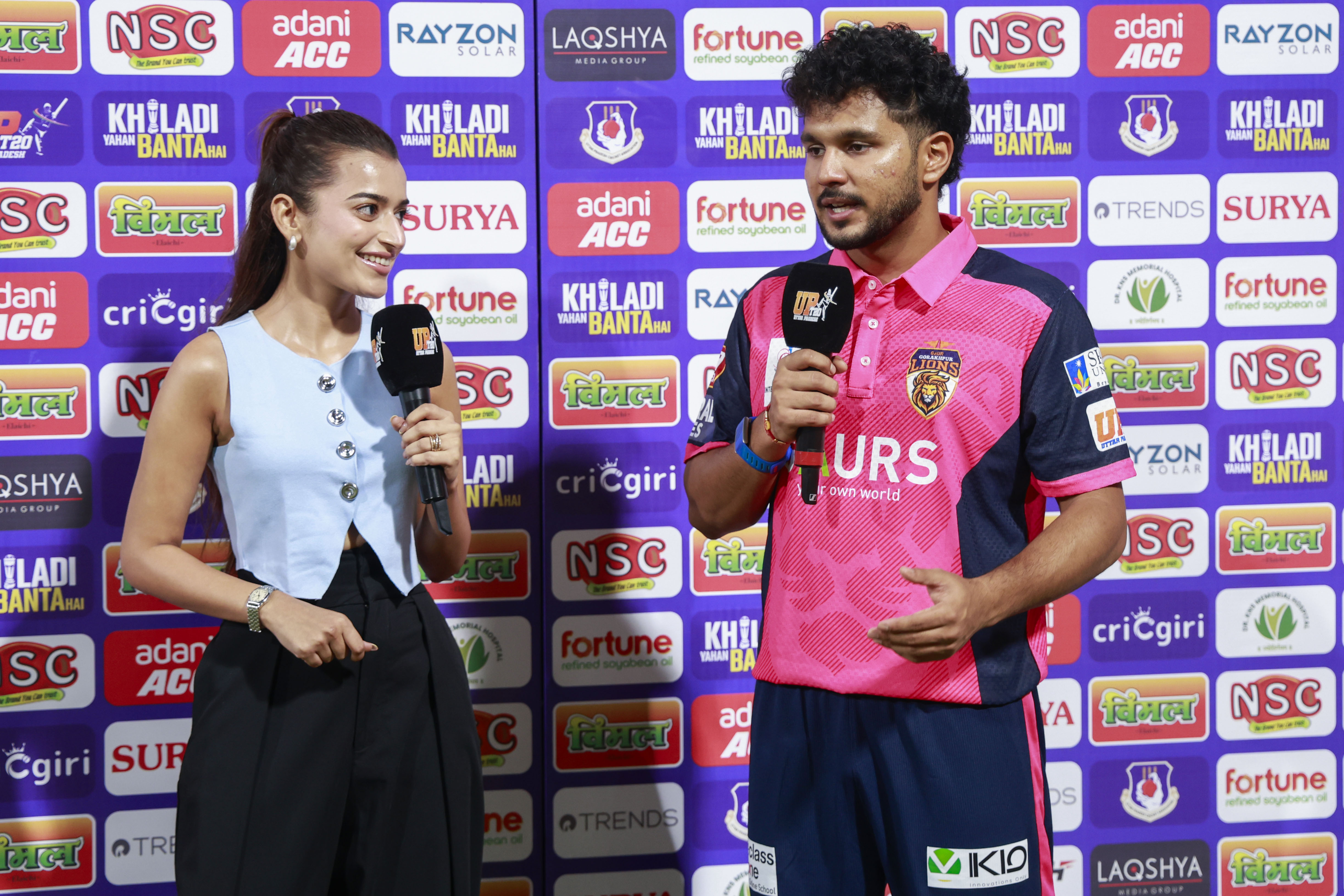 Aryan Juyal (c) of Gaur Gorakhpur Lions at TV interview Divyanshi league presenter during the UPT20 League Season 4 night clash on 16 August 2026 at Bharat Ratna Shri Atal Bihari Vajpayee Ekana Cricket Stadium, Lucknow, Uttar Pradesh, India, Gaur Gorakhpur Lions take on defending champions Meerut Mavericks in Match 5 under lights as Purvanchal’s pride meets Meerut’s grit in a high‑intensity T20 battle.Photos by: Tamal Das / aceimages.in for UPT20