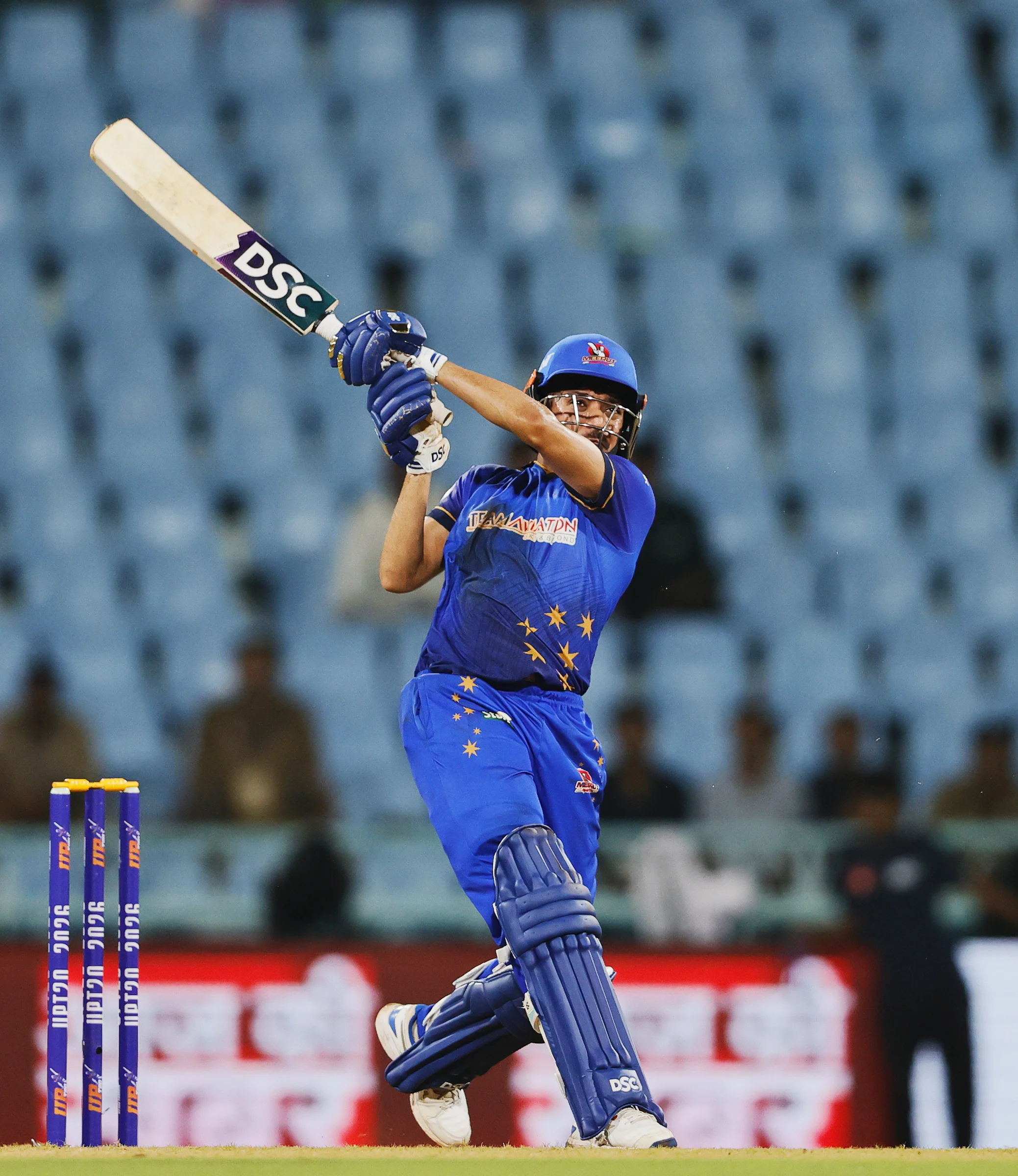 Yash Garg of Meerut Mavericks hitting a over boundary during the UPT20 League 2026 Season 4 opening clash between Kashi Rudras and defending champions Meerut Mavericks at Bharat Ratna Shri Atal Bihari Vajpayee Ekana Cricket Stadium, Lucknow, Uttar Pradesh, India, intense evening T20 action lights up Match 1 of the tournament.Photos by: s Saikat Das / aceimages.in for UPT20