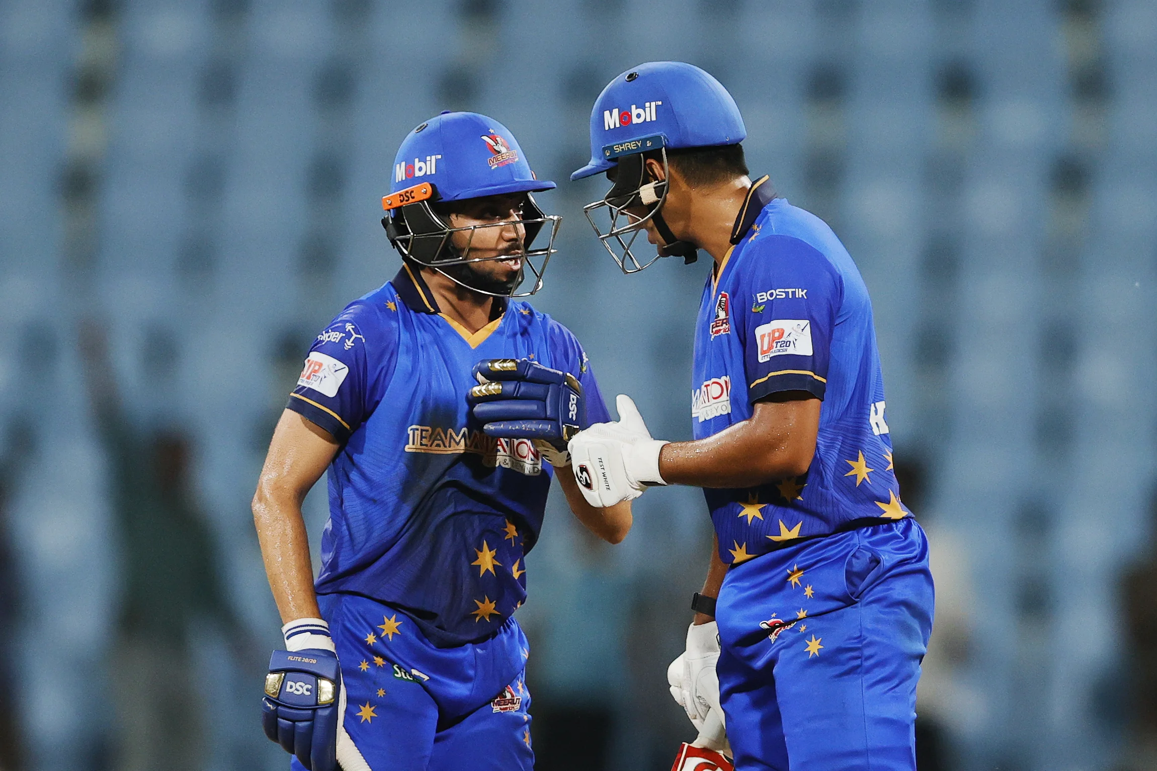 Yash Garg of Meerut Mavericks and Kartik Tyagi of Meerut Mavericks during the UPT20 League 2026 Season 4 opening clash between Kashi Rudras and defending champions Meerut Mavericks at Bharat Ratna Shri Atal Bihari Vajpayee Ekana Cricket Stadium, Lucknow, Uttar Pradesh, India, intense evening T20 action lights up Match 1 of the tournament.Photos by: s Saikat Das / aceimages.in for UPT20