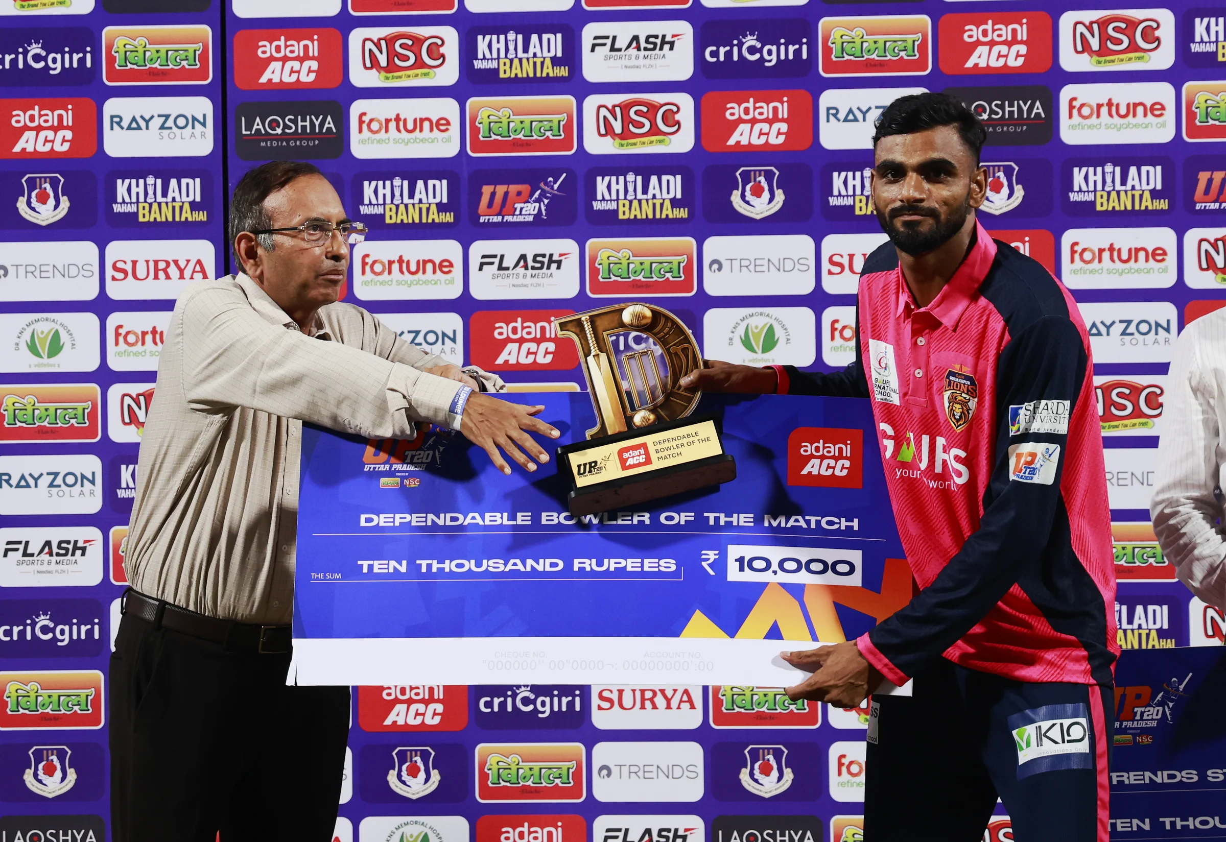 Teerath Singh of Gaur Gorakhpur Lions receiving Dependable Bowler of the Match award during the UPT20 League Season 4 night clash on 16 August 2026 at Bharat Ratna Shri Atal Bihari Vajpayee Ekana Cricket Stadium, Lucknow, Uttar Pradesh, India, Gaur Gorakhpur Lions take on defending champions Meerut Mavericks in Match 5 under lights as Purvanchal’s pride meets Meerut’s grit in a high‑intensity T20 battle.Photos by: s Saikat Das / aceimages.in for UPT20