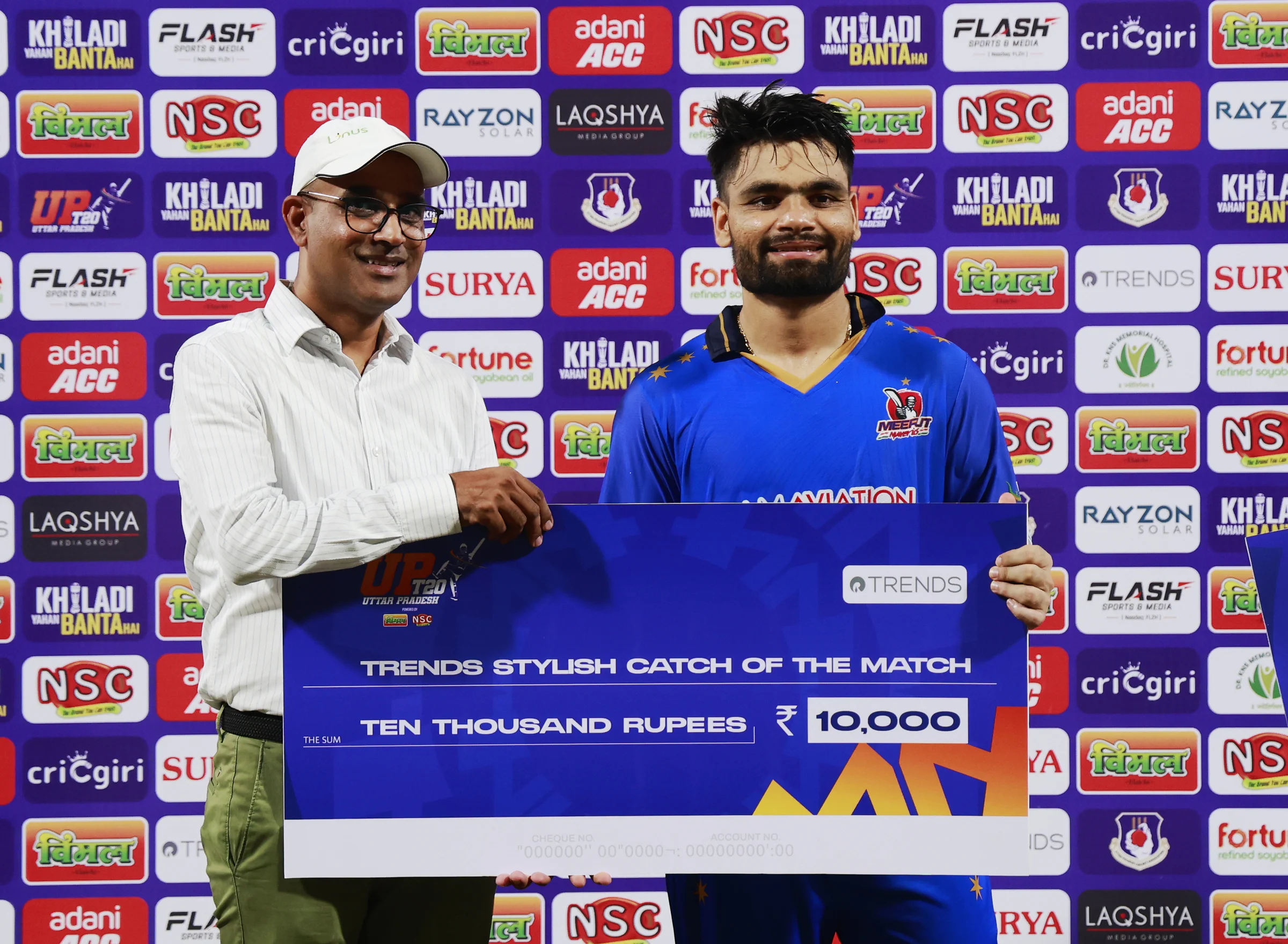 Rinku Singh of Meerut Mavericks receiving Trends Stylish Catch of the Match award during the UPT20 League Season 4 night clash on 16 August 2026 at Bharat Ratna Shri Atal Bihari Vajpayee Ekana Cricket Stadium, Lucknow, Uttar Pradesh, India, Gaur Gorakhpur Lions take on defending champions Meerut Mavericks in Match 5 under lights as Purvanchal’s pride meets Meerut’s grit in a high‑intensity T20 battle.Photos by: s Saikat Das / aceimages.in for UPT20