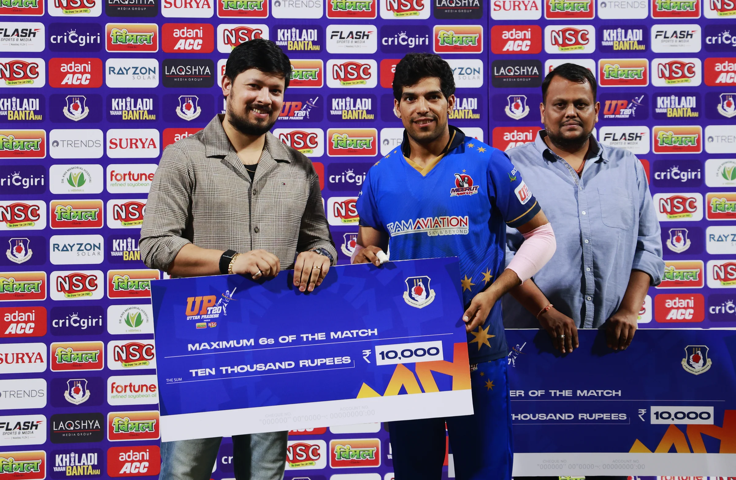 Swastik Chikara of Meerut Mavericks receiving Maximum Sixes of the Match award during the UPT20 League Season 4 night clash on 16 August 2026 at Bharat Ratna Shri Atal Bihari Vajpayee Ekana Cricket Stadium, Lucknow, Uttar Pradesh, India, Gaur Gorakhpur Lions take on defending champions Meerut Mavericks in Match 5 under lights as Purvanchal’s pride meets Meerut’s grit in a high‑intensity T20 battle.Photos by: s Saikat Das / aceimages.in for UPT20